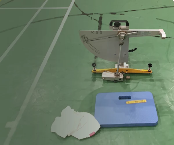 pendulum testing machine on a sports court