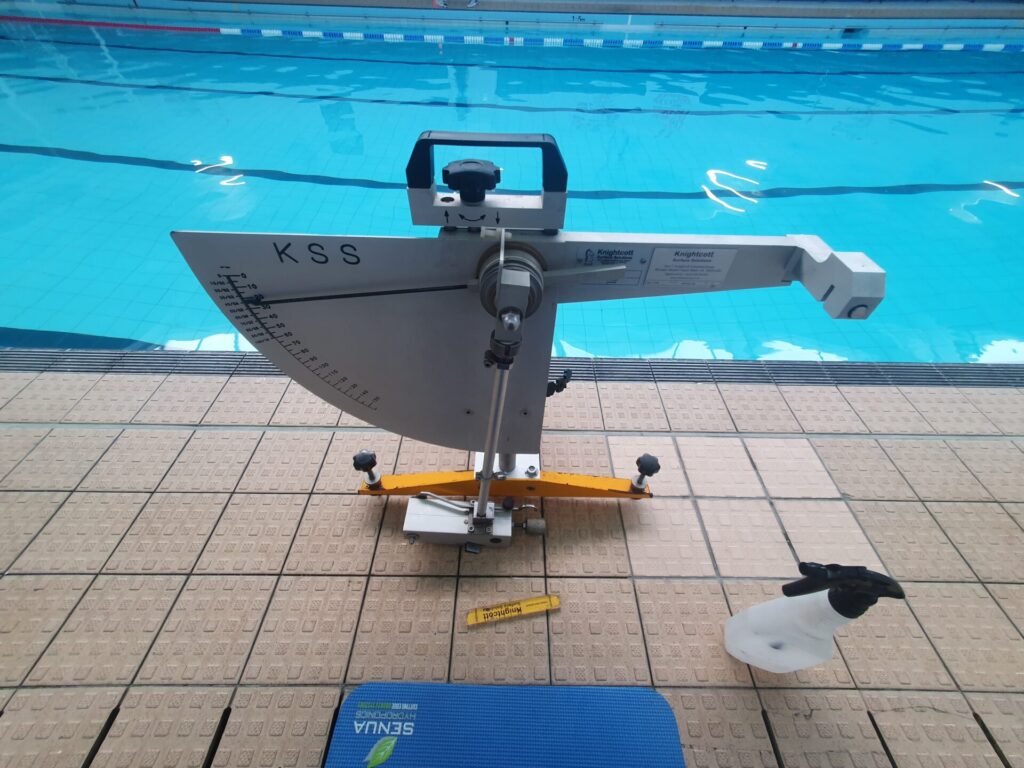 slip testing machine next to swimming pool